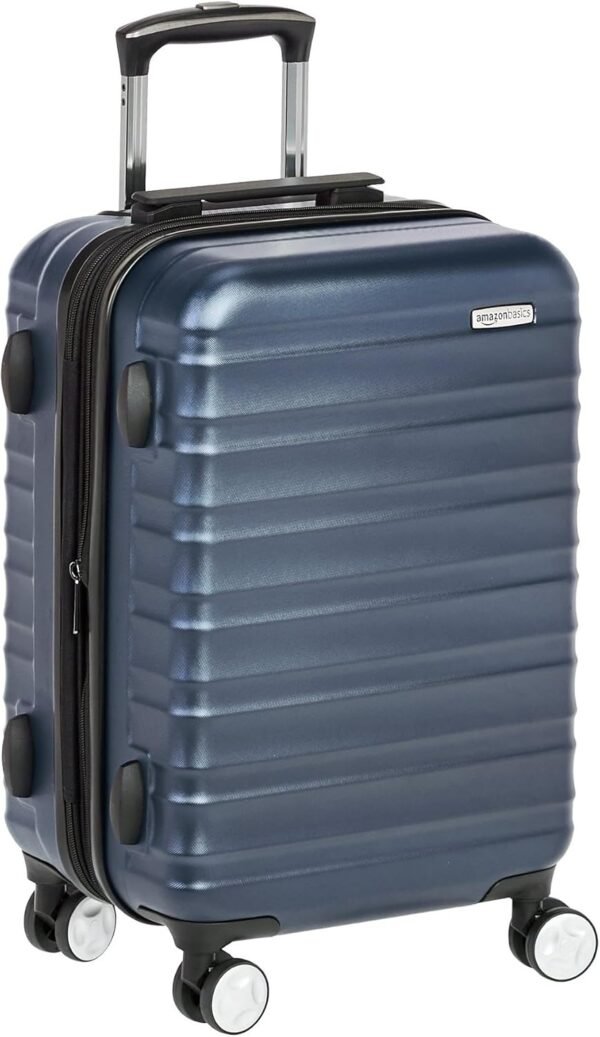 Amazon Basics 21-inch Carry On Luggage, Suitcase With Wheels (8 Spinner Wheels), TSA Lock, Expandable Space, Interior Divider and Pocket For Dry and Damp Clothes, Navy Blue - Image 2